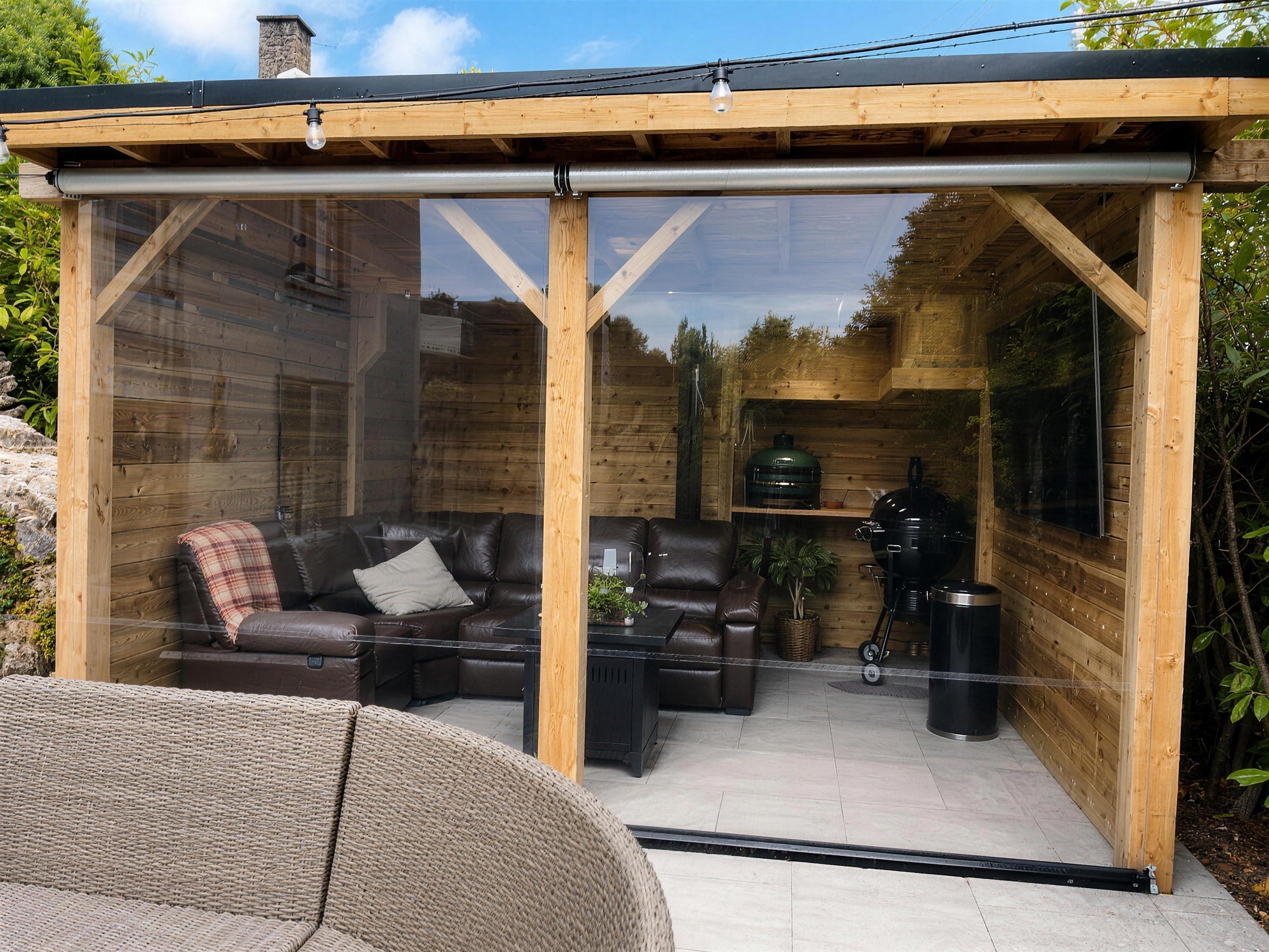 Clear roller blind on a garden structure