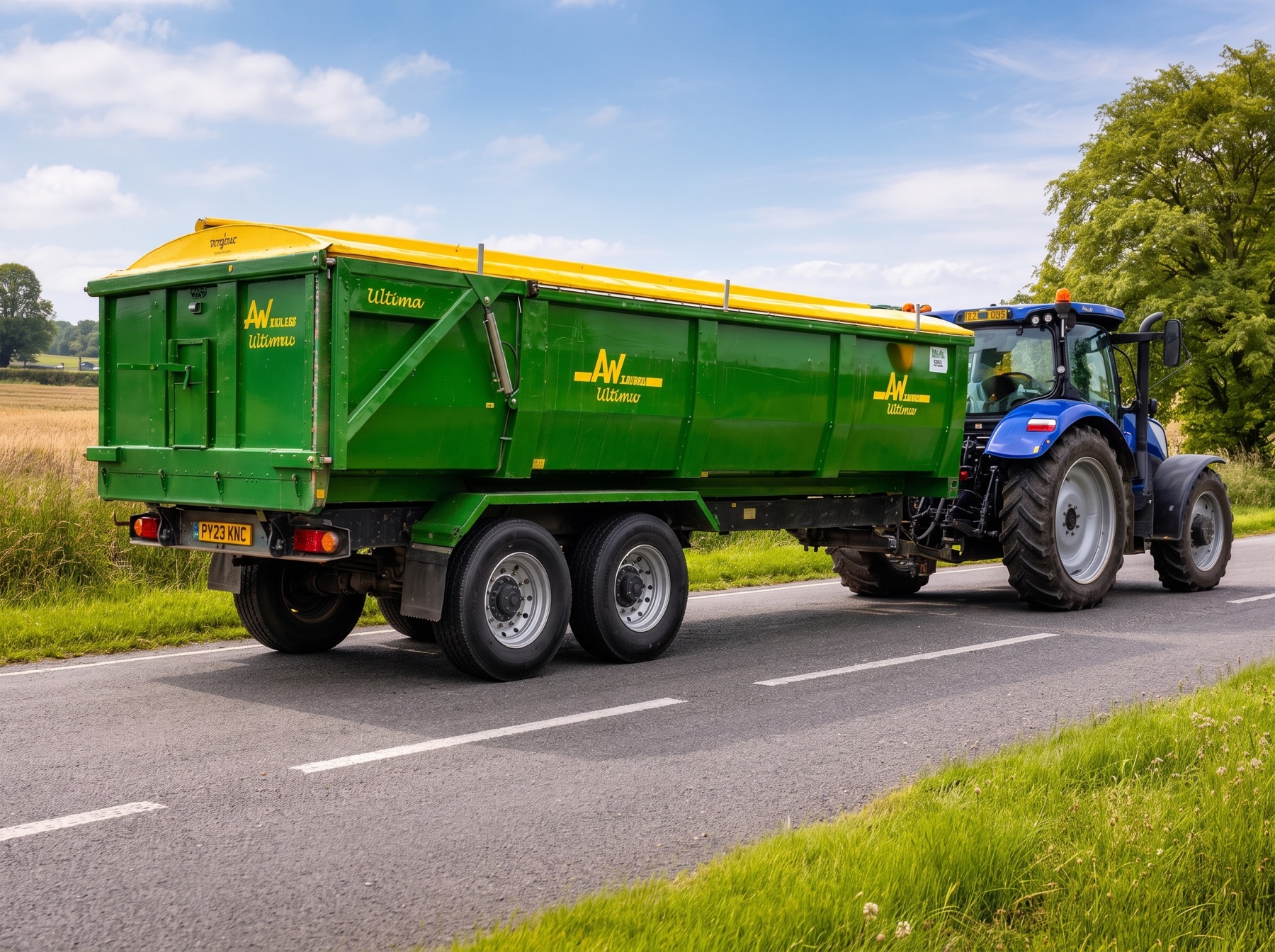 Rollover sheet fitted to a green tipper trailer out on the road
